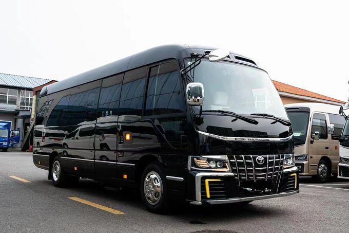Toyota Coaster 7 zitplaatsen Coach Tour Bus Benzine Achterrij 4×2 Handgeschakelde transmissie 0